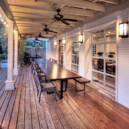 The original 17-foot mahogany bar was repurposed into a gathering table.